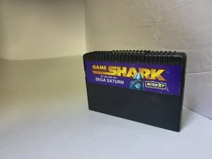 GAME SHARK Sega Saturn potenciador de juego códigos de trucos de memoria potenciador nunca usados - Imagen 1 de 4