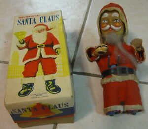 1960s EARLY VINTAGE TIN LITHO WIND-UP SANTA CLAUS FLIPPING BOOK with OTHER BOX