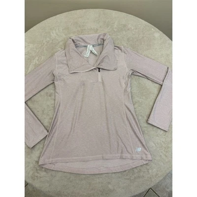 Top deportivo New Balance rosa para mujer talla pequeña manga larga Foto 1 de 4