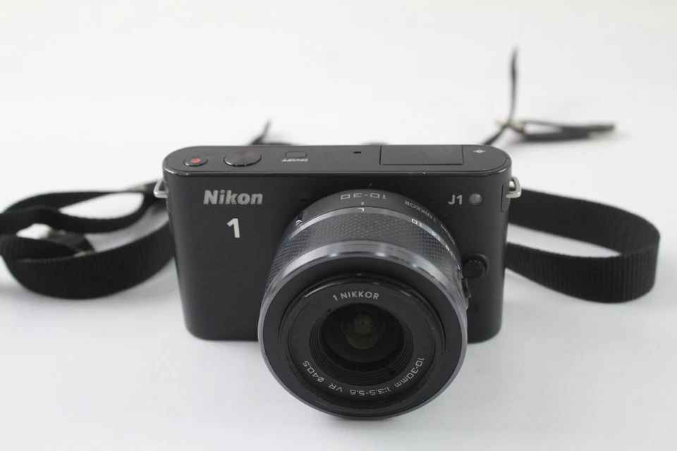 Nikon 1 J1 Mirrorless Digital Camera w/ 1 Nikkor 10-30mm F/3.5-5.6 - Image 1 of 4