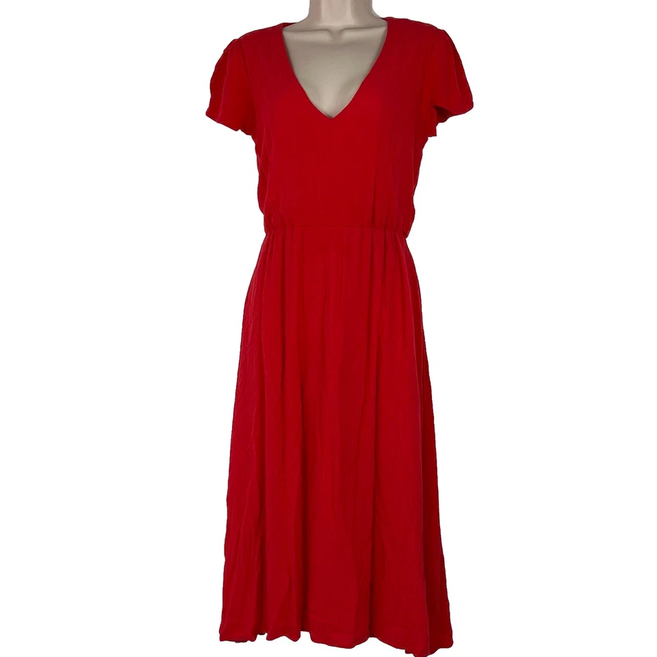 Vestido Wayf para mujer XS manga corta cuello en V línea A debajo de la rodilla calce y acampanado rosa Foto 1 de 4