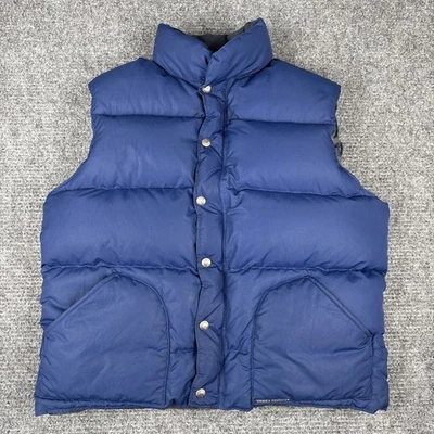 Chaleco acolchado de plumón de ganso Sierra Designs para hombre talla grande azul oscuro con saco de cosas Foto 1 de 4