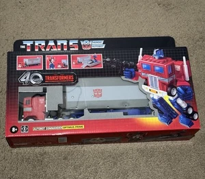 Transformers 40 Years More Than Meets the Eye Optimus Prime Autobot Commander - Picture 1 of 4