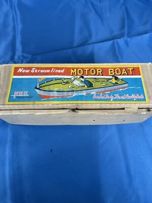 (En caja) Lancha a motor forrada con arroyo NBK juguete artesanal Chris de colección de madera y hojalata Foto 1 de 4