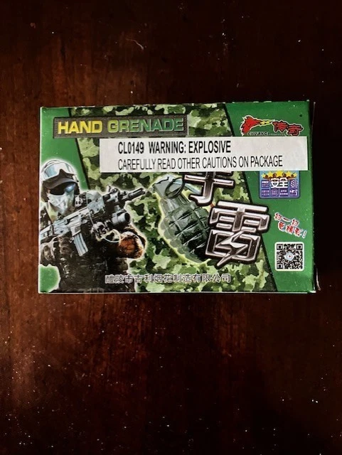 Etiqueta de caja de granadas de mano de juguete vintage Foto 1 de 1