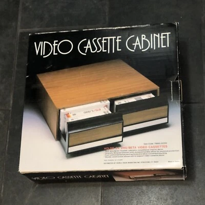 Gabinete de cinta VHS casete de video de grano de madera para 24 cintas beta VHS NUEVO CON caja de colección Foto 1 de 4