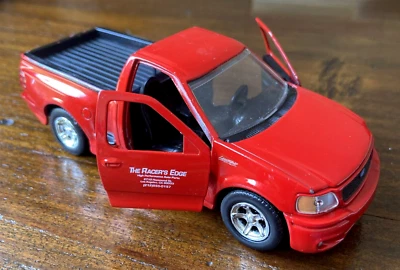FAST & FURIOUS Diecast Jada Toys 1999 Brian's Ford F-150 SVT Lightning Red 1:32 - Image 1 of 4