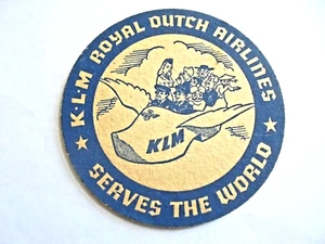 Vintage KLM Royal Dutch Airlines bedient die Welt Werbung Getränk Untersetzer - Bild 1 von 2