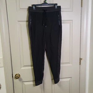 Athleta Damen Jogginghose schwarz Größe 8 Taschen zum Überziehen verstellbarer Bund Nylon - Bild 1 von 4