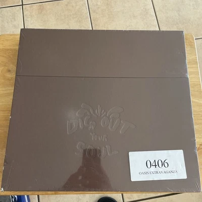 New OASIS deluxe box set Dig Out Your Soul 4 12” Vinyl, 2 CD’s, 1 DVD plus book - Image 1 of 4