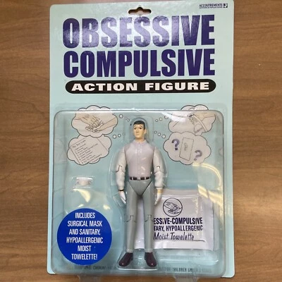 Figura de acción obsesiva compulsiva que incluye máscara facial y toalla húmeda Foto 1 de 2