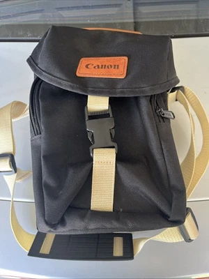 Bolso de hombro vintage de lona negra y tostada para cámara Canon con correa ajustable Foto 1 de 4