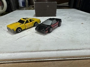 1983 Mattel Hot Wheels Crash UPS Taxi And Pink Super X Lot Of 2 - Picture 1 of 9