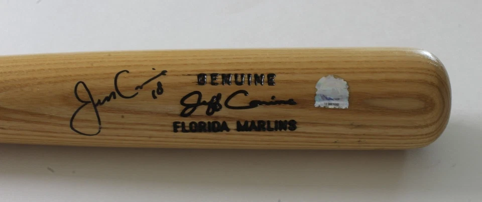 Bate de béisbol firmado por los Marlins de Florida Louisville Slugger Jeff Conine con certificado de autenticidad 2005 Foto 1 de 4