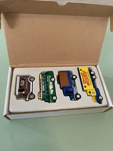 NIB Golden Wheel Set 4 Die Cast Trucks Pepsi Cola Humor Zoo Mail Truck NEW! - Picture 1 of 5