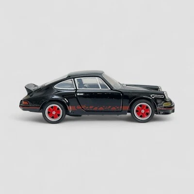 1973 Porsche 911 Carrera RS Black Welly 1:36 Die-cast Car Red Wheels pull back - image 1 of 4