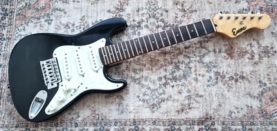 Guitarra Eléctrica - Encore - Tamaño 1/2 - Stratocaster - Strat Negro Brillante - Bolsa de Concierto Foto 1 de 4