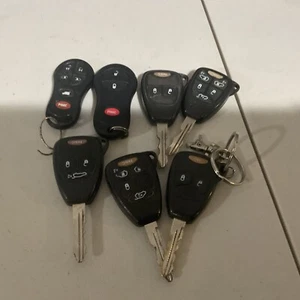 Lot of 7 Jeep Dodge Chrysler Used Key Fobs - Picture 1 of 6
