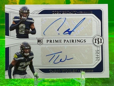 #10/25 2022 DUAL AUTO RC Tariq Woolen Coby Bryant National Treasures SEAHAWKS - Image 1 of 2