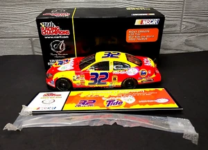 RICKY CRAVEN RC AUTHENTICS #32 TIDE GIVE KIDS THE WORLD FORD TAURUS 1:24 - Picture 1 of 8