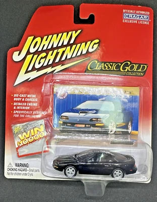 Johnny Lightning - 1994 Chevy Camaro Z28   Classic Gold  2004 - Immagine 1 di 3