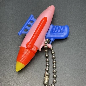 Vintage Small Plastic Space Ray Gun Keychain Puzzle Multi Colors - Picture 1 of 6