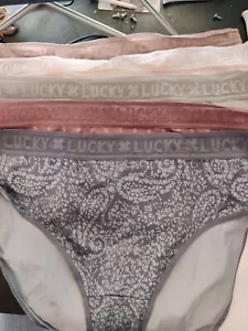 SCATOLA APERTA Lucky Brand slip donna senza cuciture 5 pezzi mutandine colori taglia M $70 4C634 - Foto 1 di 1