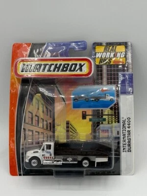 MATCHBOX WORKING RIGS 2008 INTERNATIONAL DURASTAR 4400 FLATBED HAULER - Image 1 of 2