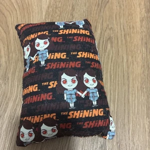 Das glänzende Kissen - Bild 1 von 3