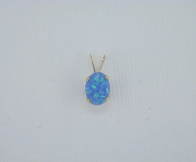 14kt Yellow Gold 8 x 6 mm Oval Created Blue Opal Pendant - Image 1 of 3