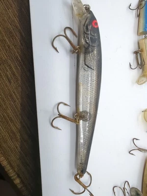 BOMBARDERO GRADO AGUA SALADA LARGO A 6" 7/8 OZ PLATA Negro Humo De colección  Foto 1 de 3