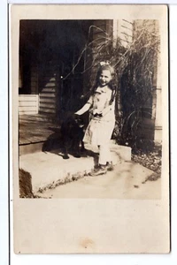 DOG RPPC Cute Little Girl PORCH Black Dog AZO OLD Vintage Real Photo Postcard - Picture 1 of 2