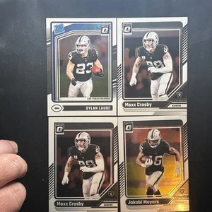 Lote 2024 Optic Raiders Clasificado Novato Dylan Laube Base Max Crosby, Jakobi Meyers - Imagen 1 de 5