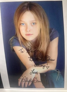Dakota Fanning hand SIGNED 8x10" Photo Autograph Not Authenticated Read: - Picture 1 of 3