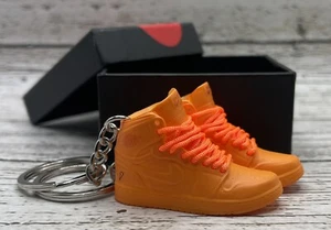 Par de llaveros para zapatillas de baloncesto 3D naranja con caja mini regalo bombo zapatilla - Imagen 1 de 1