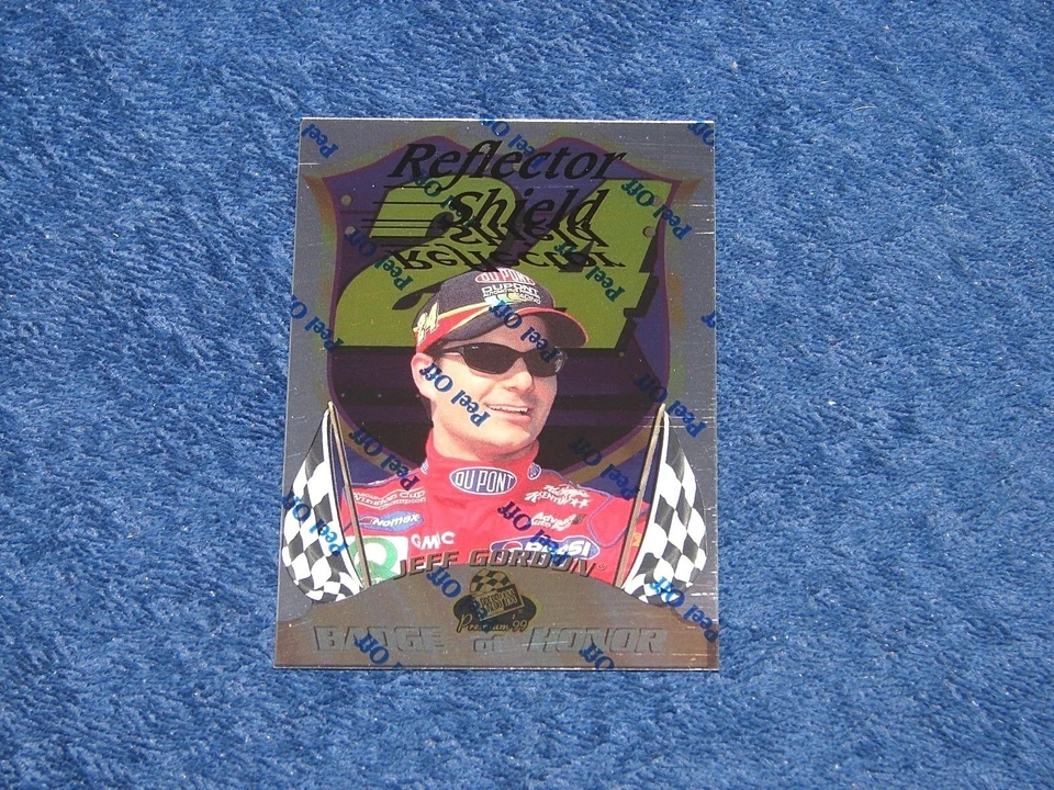 JEFF GORDON 1999 PRESS PASS PREMIUM BADGE OF HONOR REFLECTORS #BH10 (SB-3) - Image 1 of 1