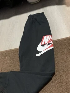 Nike Sweat Pants Youth Large Black Faded Embroidered Swoosh Logo Tapered Joggers - Picture 1 of 3