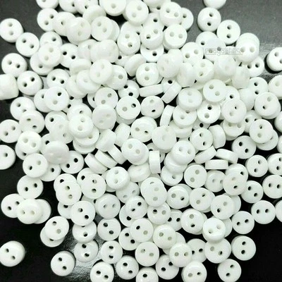 15X 30X PUPPENKNÖPFE 6MM ZWEILOCH KNÖPFE ACRYL BABY KNOPF KINDER MINI KIND WEISS - Bild 1 von 2