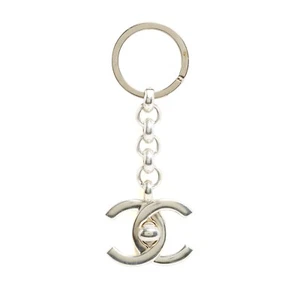 Chanel 1996 Keychain or Charm CC Silver Turnlock Key Holder Gold Charm - Picture 1 of 3