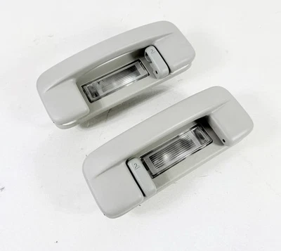 Jeep Grand Cherokee 2005-2010 manijas de agarre de techo trasero con luces izquierda y derecha OEM Foto 1 de 4