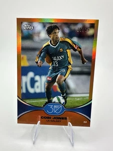 2025 Topps MLS 30th Anniversary Collection #12 Cobi Jones Orange /25 - Picture 1 of 2