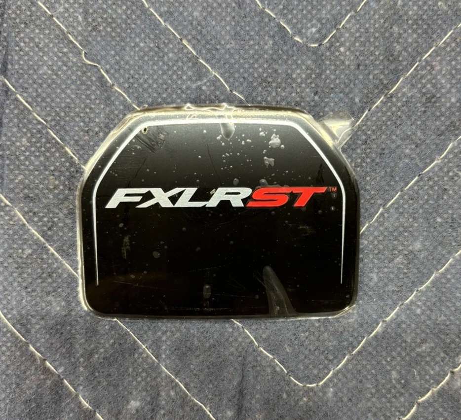 HARLEY DAVIDSON LOW RIDER ST TANK CONSOLE BADGE - RED ST - NEW OEM - Image 1 of 1