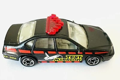 Matchbox 1999 Mattel-Chevrolet Impala TEST MISSION PATROL CAR 1/64 SCALE - Image 1 of 4