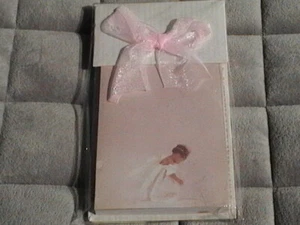 Betsy Cameron Pink Notepad/Stand with Bow. Girl kneeling on bottom of notepads - Picture 1 of 4