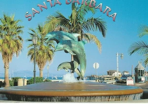 4x6 postcardGreetings from Santa Barbara, California. The dolphin statue stands - Picture 1 of 2