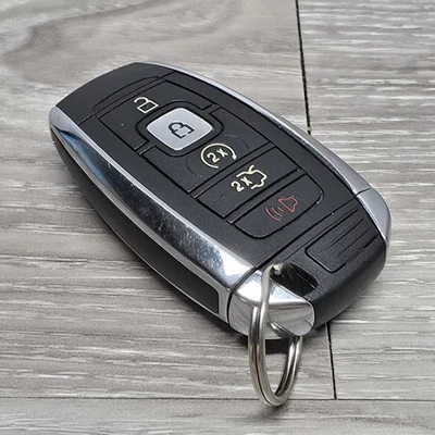 ORIGINAL LINCOLN 17-21 OEM SMART KEY LESS ENTRY REMOTE START FOB - USED  - Image 1 of 4