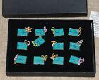 WALT DISNEY CLASSICS COLLECTION SET OF 12 BADGE PINS IN BOX - MICKEY MOUSE