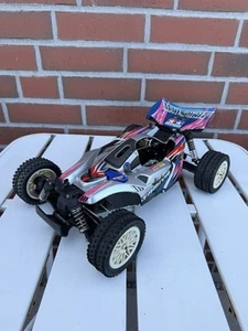 TAMIYA MAD SPIRIT TNS-B R/C NITRO QUEMADOR BUGGY 1:10 4X4 SIN MOTOR - Imagen 1 de 12