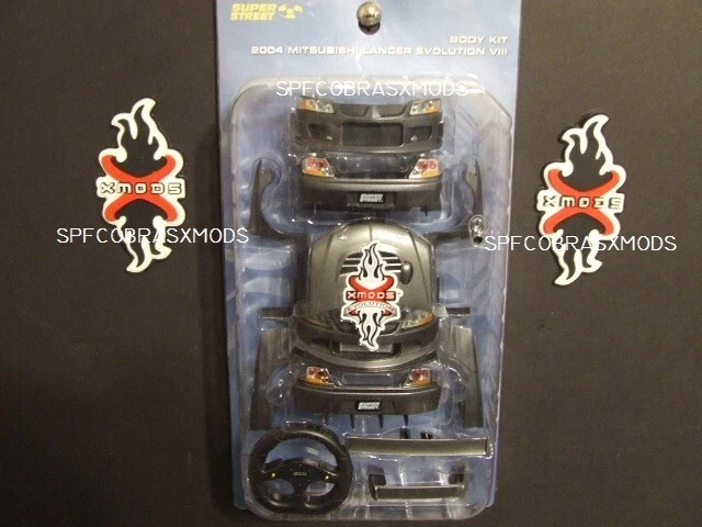****XMODS 2004 MITSUBISHI LANCER BODY KIT NEW IN BOX**** - Image 1 of 1