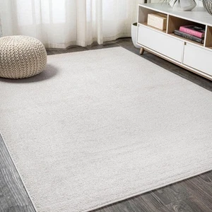 Haze Solid Low-Pile Ivory 9 ft. x 12 ft. Area Rug - Picture 1 of 12